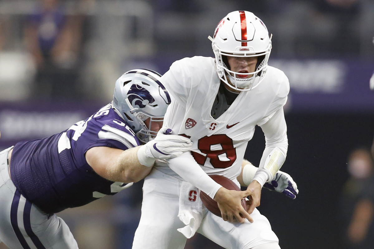 Kansas State defensive tackle Eli Huggins (92) sacks Stanford quarterback Tanner McKee (18).